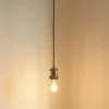 Lámpara colgante Lindby Hattie, portalámpara E27, latón, Ø 5 cm
