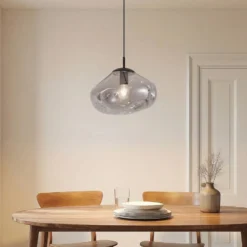Lámpara colgante Lindby Lelia, gris humo, cristal, Ø 35 cm