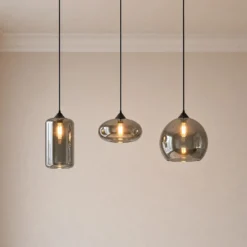 Lámpara colgante Lindby Marla, 3 luces, cristal, gris ahumado, 102cm