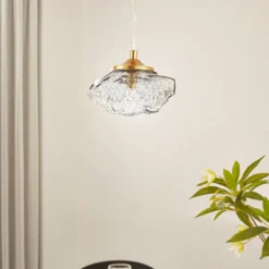 Lámpara colgante Lindby Piatra, humo/latón, cristal, Ø 16 cm, G9