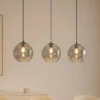 Lámpara colgante Lucande Brillar, gris humo, cristal, 3 luces, 128 cm