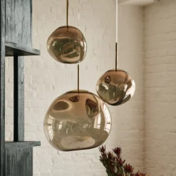 Lámpara colgante Melt de Tom Dixon, Ø 28 cm, color bronce, portalámparas