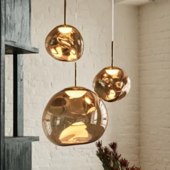 Lámpara colgante Melt de Tom Dixon, Ø 28 cm, color bronce, portalámparas
