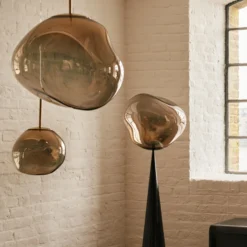 Lámpara colgante Melt de Tom Dixon, Ø 28 cm, color bronce, portalámparas