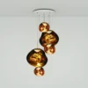 Lámpara colgante Melt Large Round de Tom Dixon, Ø 95 cm, dorada