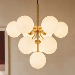 Lámpara colgante Peyton de Lucande, 10 luces, dorado/blanco, cristal