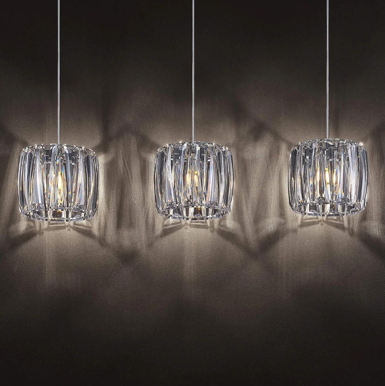 Lámpara colgante Sofia de Lindby, 107 cm, 3 luces, E14, cromo/claro