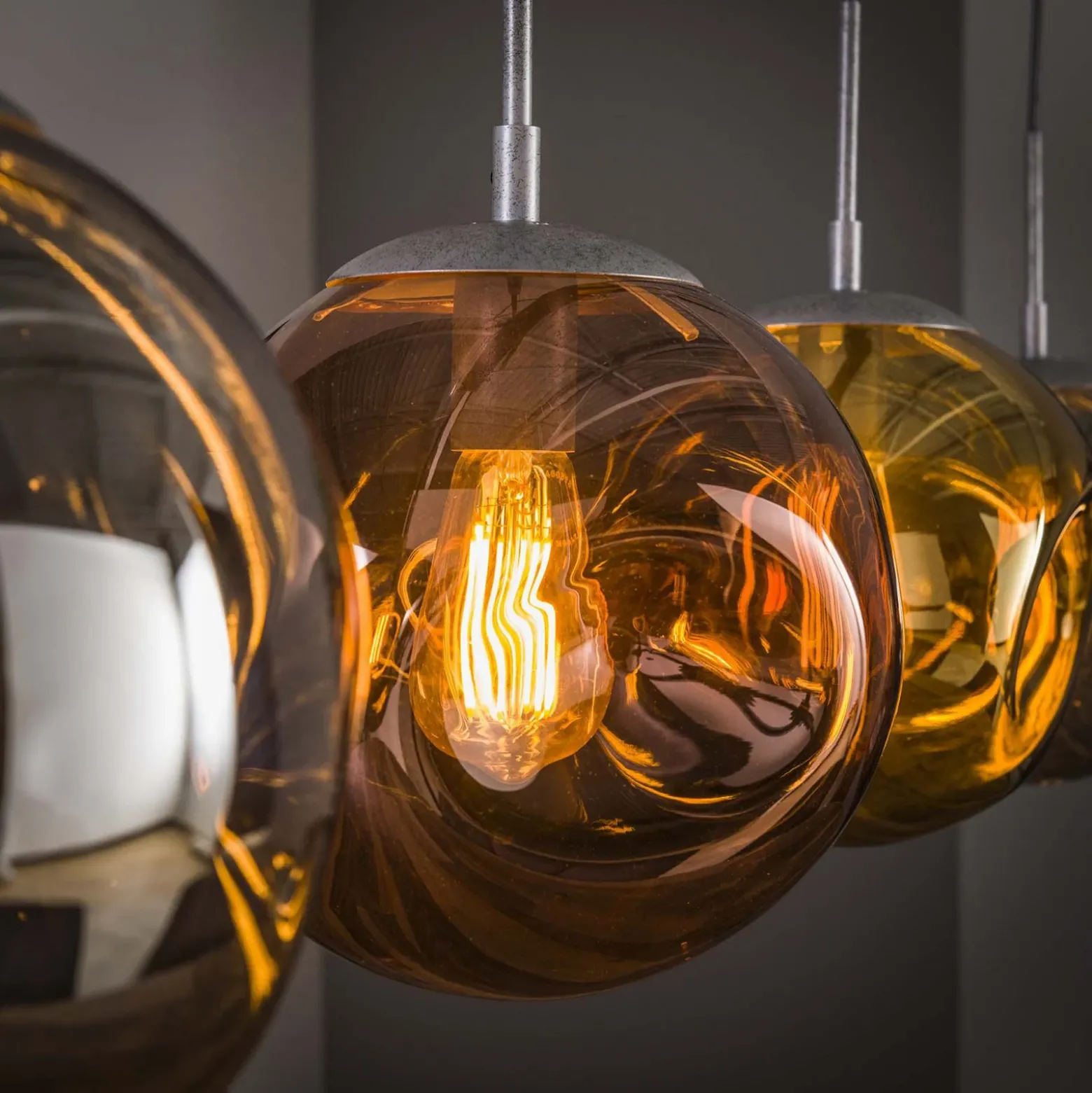Lámpara colgante Stellar, 4 luces, alargada, plata envejecida, cristal
