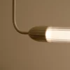 Lámpara colgante UMAGE LEMON SQUEEZE LINEAR, latón 138 cm GU10