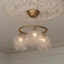 Lámpara de araña Nuura Miira 3 Circular, Ø 54 cm, latón/transparente