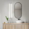 Lámpara de espejo LED Helestra LOOM, longitud 90 cm, cromada, IP44