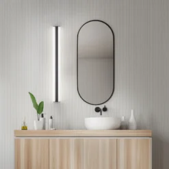 Lámpara de espejo LED Helestra LOOM, longitud 90 cm, negro, IP44