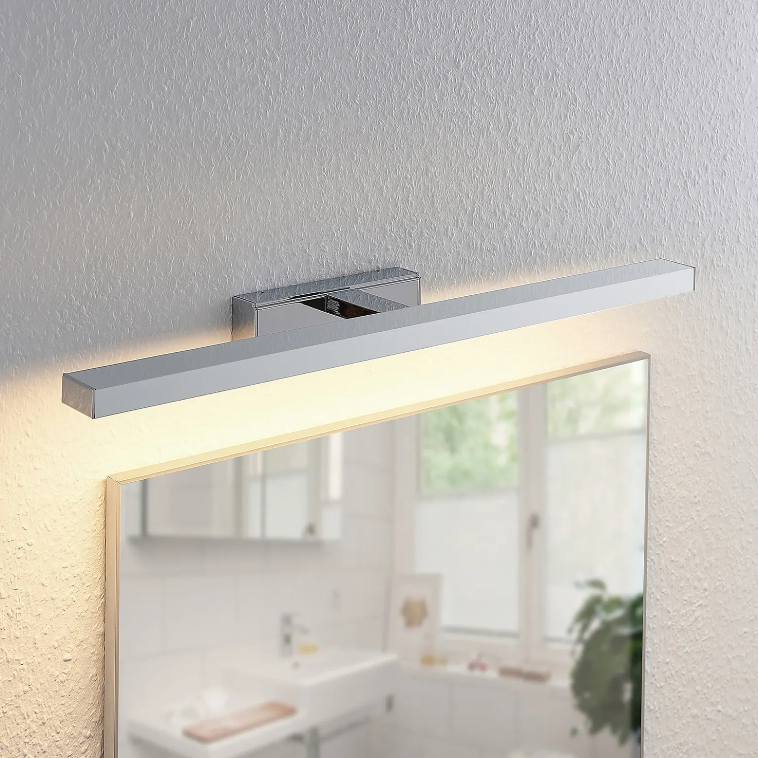 Lámpara de espejo LED Jukka de Lindby, 60 cm, cromo, metal, IP44