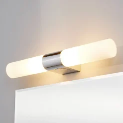 Lámpara de espejo Ziva de Lindby, enchufe, blanco, cristal, IP44