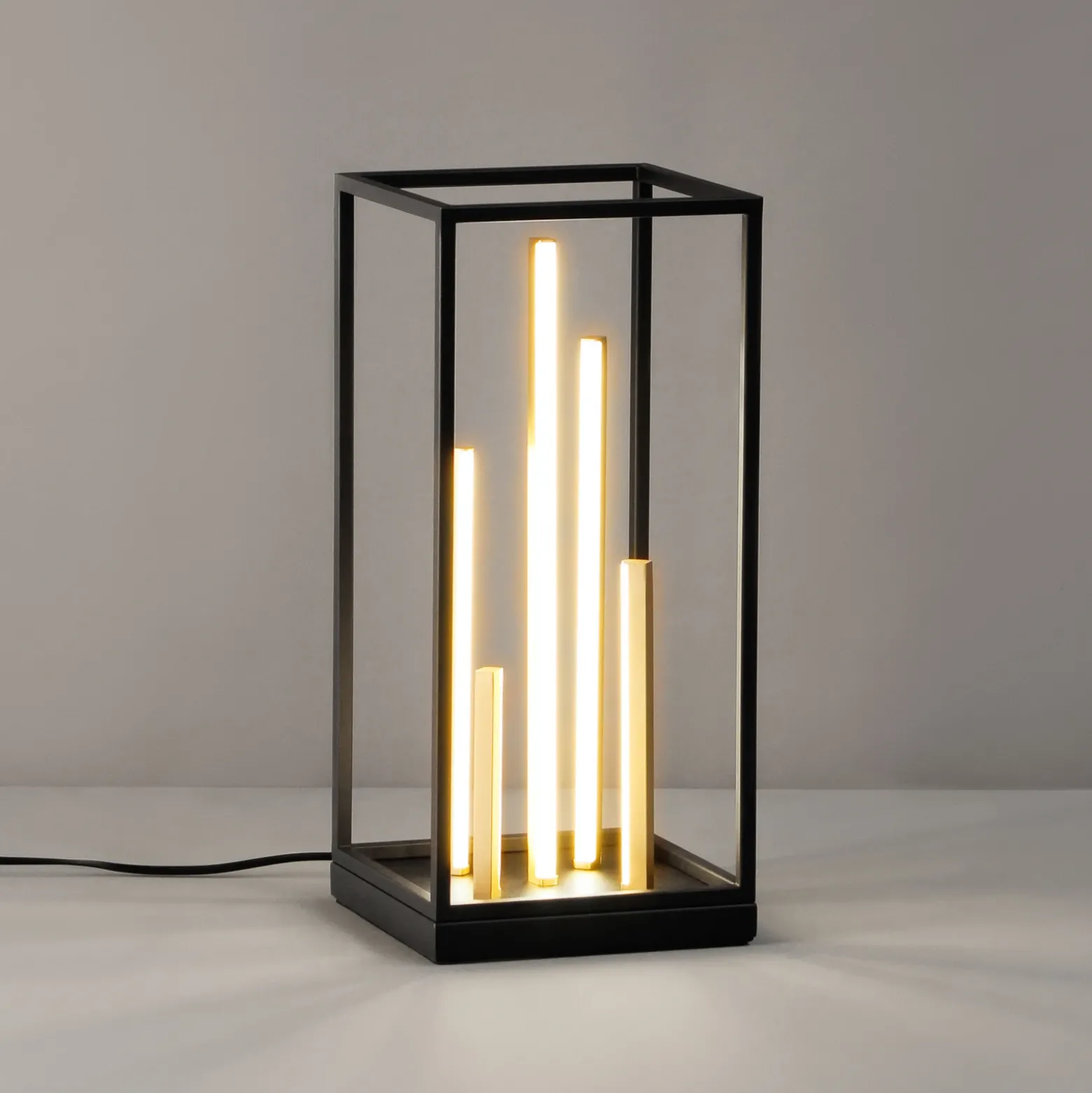 Lámpara de mesa LED Grid, negro/oro, metal, CCT, atenuable