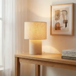 Lámpara de mesa Lindby Elfie, Ø 23 cm, beige, lino, E27