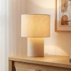 Lámpara de mesa Lindby Elfie, Ø 23 cm, beige, lino, E27