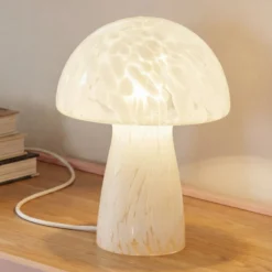 Lámpara de mesa Lindby Hubi, blanca, cristal, Ø 22 cm, forma de seta