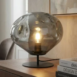 Lámpara de mesa Lindby Lelia, gris humo, cristal, metal, Ø 35 cm