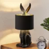Lámpara de mesa Lindby Lorentina, 56 cm, conejo, negro, textil