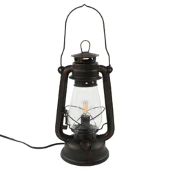 Lámpara de mesa Lindby Raisa, color óxido, metal, farol, E14
