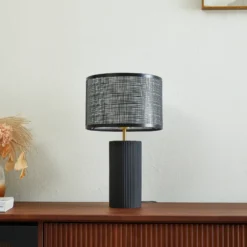 Lámpara de mesa Lindby Sorscha, negra, hierro, Ø 26 cm