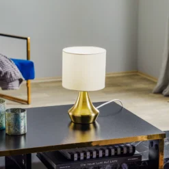 Lámpara de mesa Ottone con pantalla textil, latón