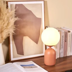 Lámpara de mesa Pauleen Glowing Charm, base de cerámica oxidada