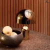 Lámpara de mesa recargable BELL PORTABLE de Tom Dixon, cobre, 28 cm IP44