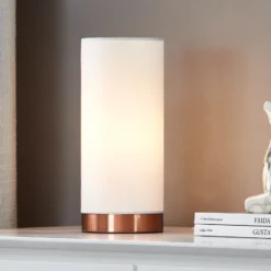Lámpara de mesa Ronja blanca con base color cobre