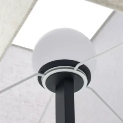 Lámpara de pie LED Quitani Lisene, roble/negro/natural, 162 cm, atenuable.