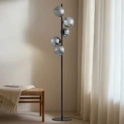 Lámpara de pie Lindby Orbelia, negra, 5 luces, cristal