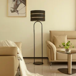 Lámpara de pie Lindby Tsomo, Ø 40 cm, negra, tela, E27