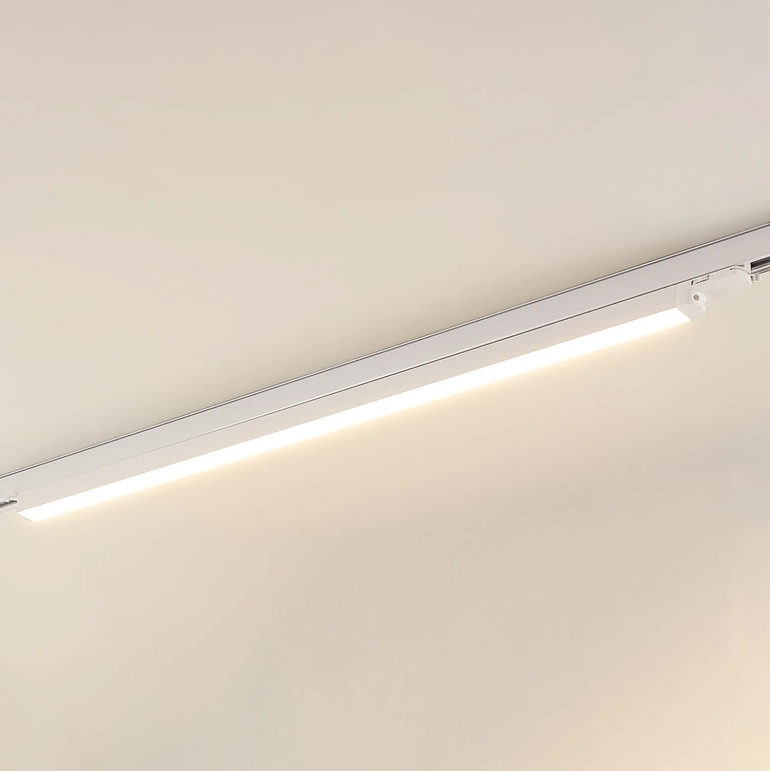 Lámpara de riel LED Arcchio Harlow, blanca, 109 cm, 3000 K