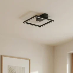 Lámpara de techo LED Yulla de Lindby, 34 cm, negra, con sensor