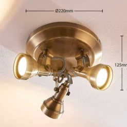 Lámpara de techo Lindby Perseas, Ø 22cm, 3 luces, latón antiguo, GU10