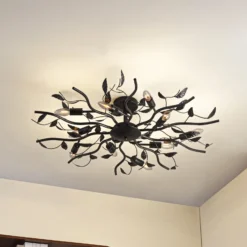 Lámpara de techo Lindby Yos, 10 luces, 95 cm, negro y dorado, E14