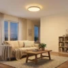 Lámpara LED de techo Lindby Emiva, Ø 49 cm, CCT, madera