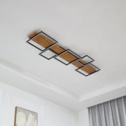 Lámpara LED de techo Lindby Galad, negra, madera, 5 luces, 140 cm