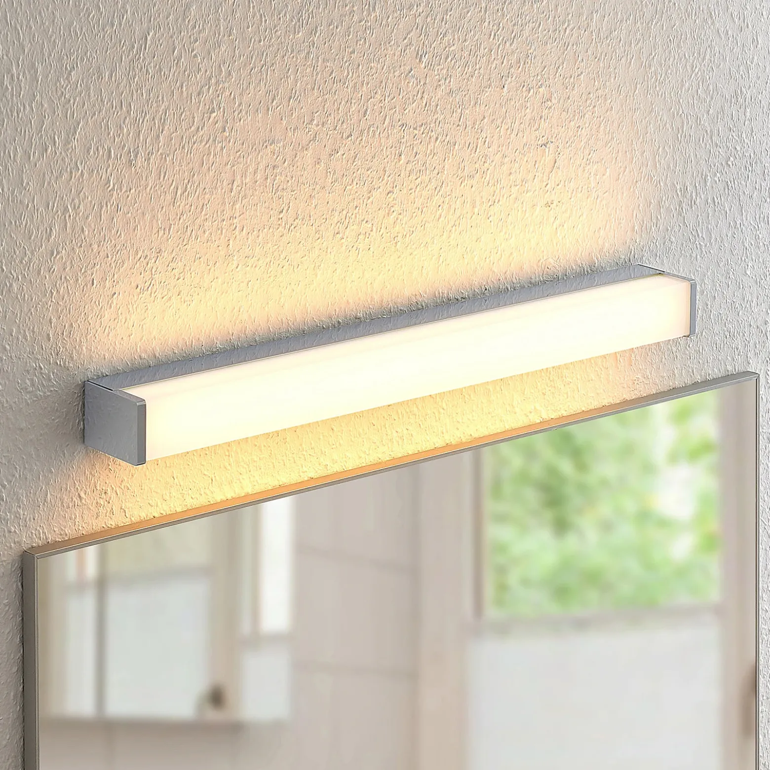 Lámpara LED para cuarto de baño Klea de Lindby, 60 cm, cromo, metal, IP44
