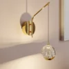 Lucande aplique de pared LED Hayley, color dorado, cristal, 34 cm de altura