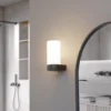 Lucande Basolo aplique para baño, negro, altura 17,2 cm, cristal