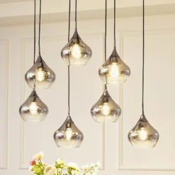 Lucande lámpara colgante Jarven, 7 luces, negro, cristal