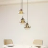 Lucande lámpara colgante Jarven, 3 luces, negro, cristal