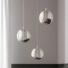 Lucande Lámpara colgante LED Hayley, Ø 25 cm, 3 luces, cromo, cristal