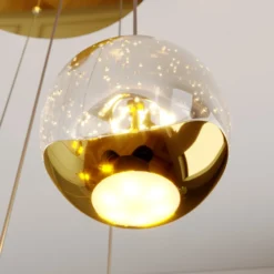 Lucande Lámpara colgante LED Hayley, Ø 40 cm, 9 luces, dorado, cristal