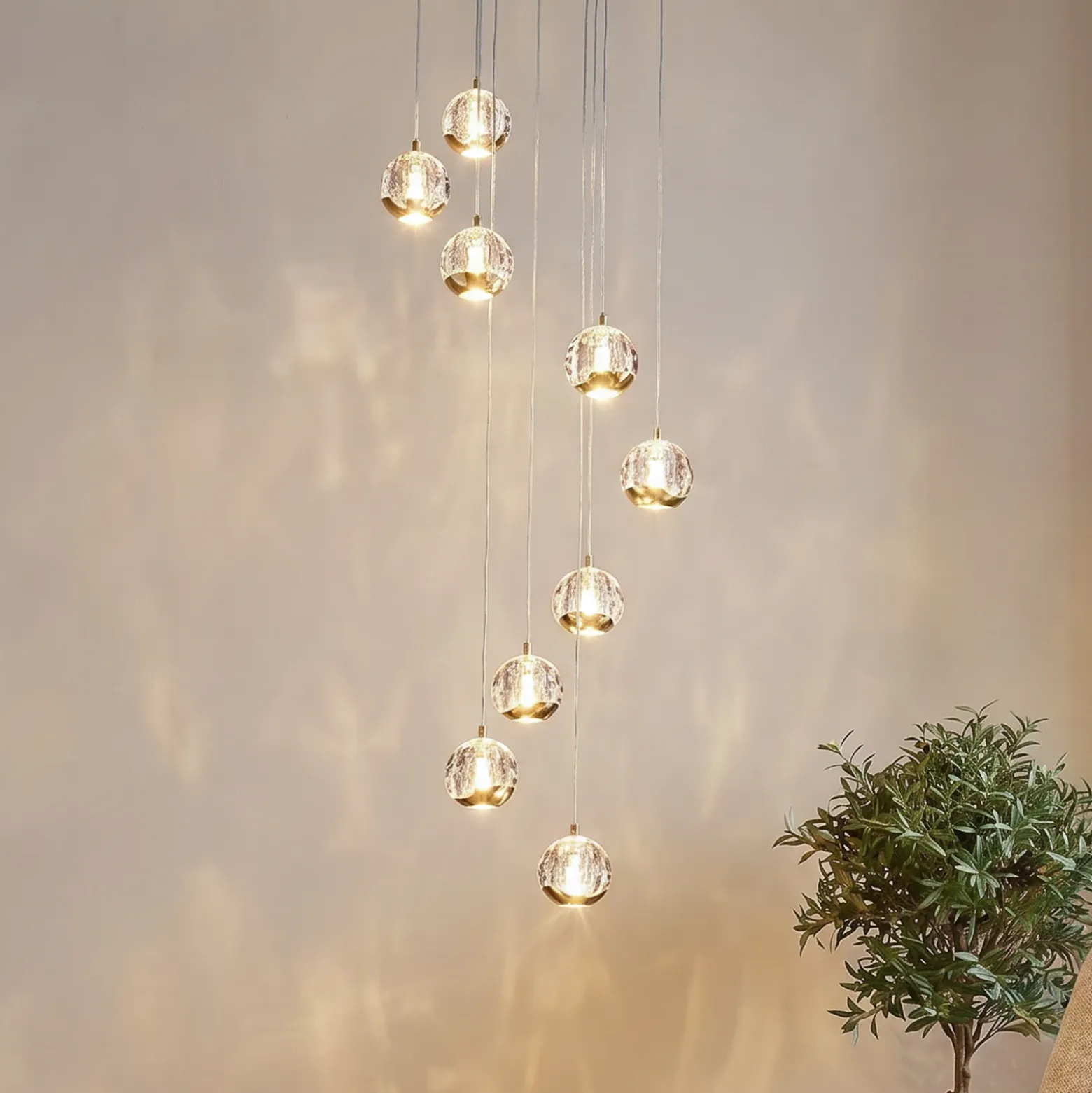 Lucande Lámpara colgante LED Hayley, Ø 40 cm, 9 luces, dorado, cristal
