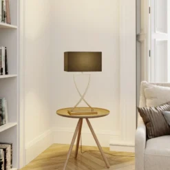Lucande lámpara de mesa Evaine, latón/negro, 66 cm, E27