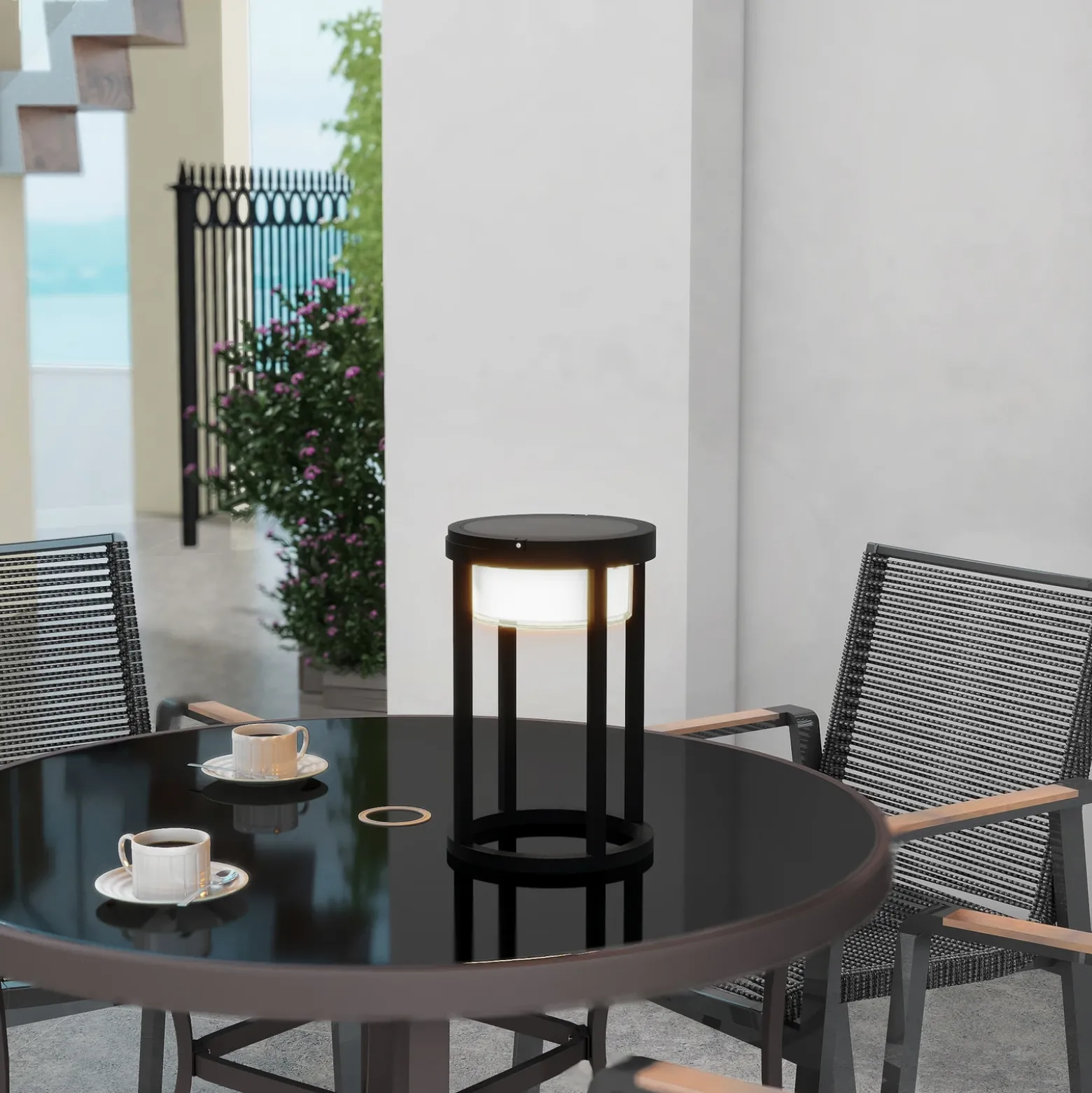 Lucande Lámpara de mesa solar LED Tilena, redonda, negra, atenuable