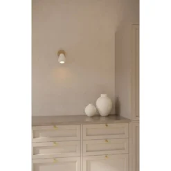 Nuura downlight Foco de techo Anoli Spot Surface Altura 20 cm dorado/blanco